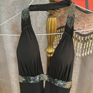 Black elegance BCBG maxazria size XS , high & low dress with a tie back.